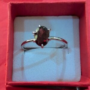 Elegant Sterling Silver Ring with Red Gemstone
